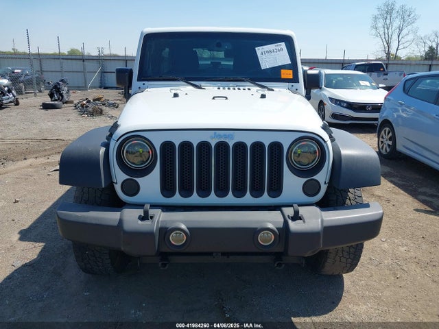 1C4BJWDG8EL144417 Jeep Wrangler Unlimited Sport