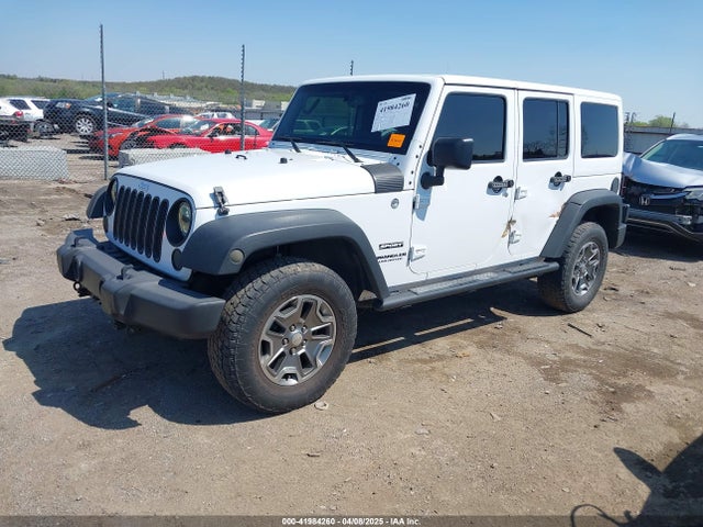 1C4BJWDG8EL144417 Jeep Wrangler Unlimited Sport