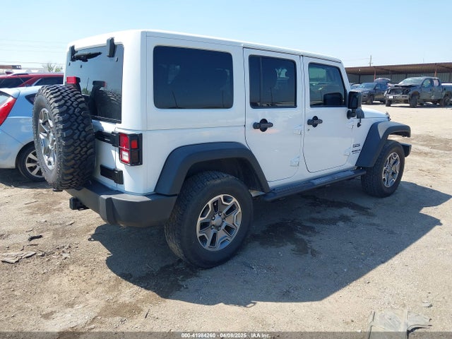 1C4BJWDG8EL144417 Jeep Wrangler Unlimited Sport