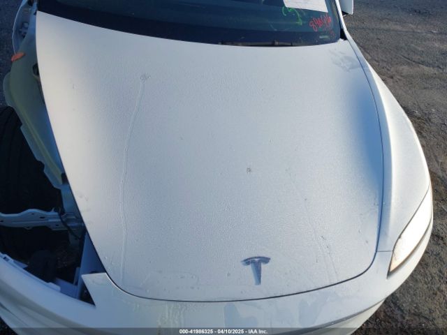 5YJ3E1EA8RF848616 Tesla 2024