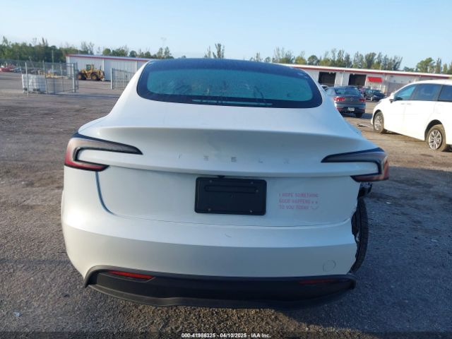 5YJ3E1EA8RF848616 Tesla 2024