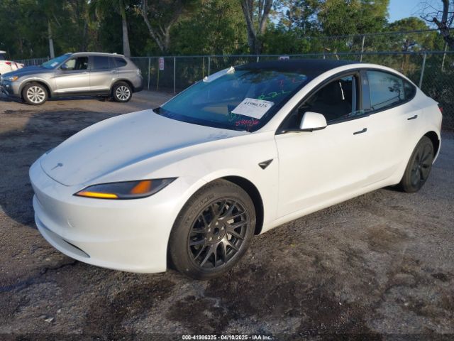5YJ3E1EA8RF848616 Tesla 2024