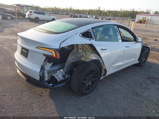 5YJ3E1EA8RF848616 Tesla 2024