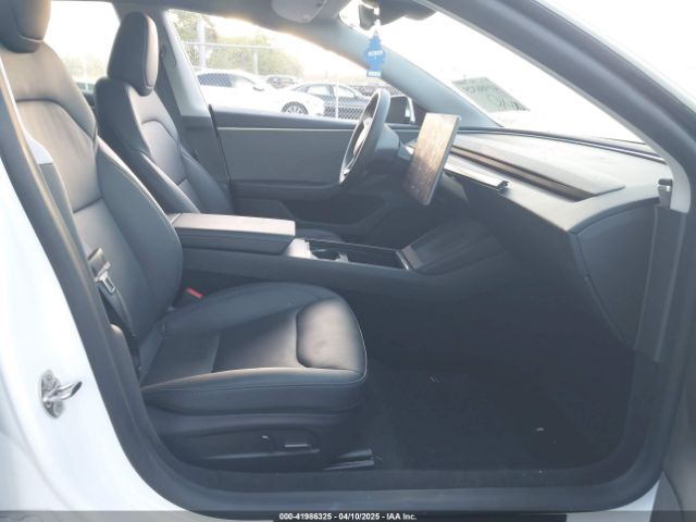 5YJ3E1EA8RF848616 Tesla 2024