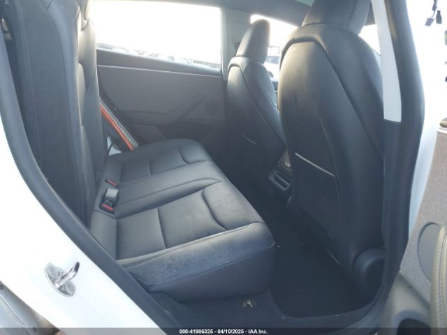 5YJ3E1EA8RF848616 Tesla 2024