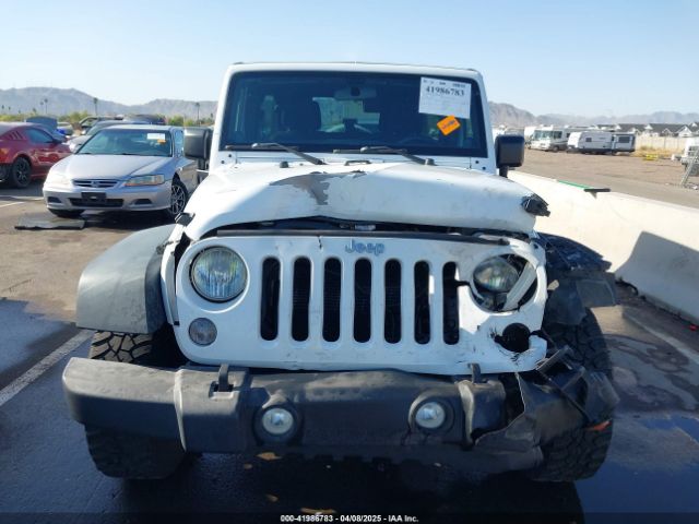 1C4BJWDG3EL247535 Jeep Wrangler Unlimited Sport