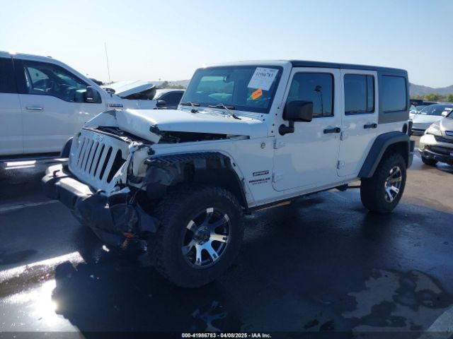 1C4BJWDG3EL247535 Jeep Wrangler Unlimited Sport