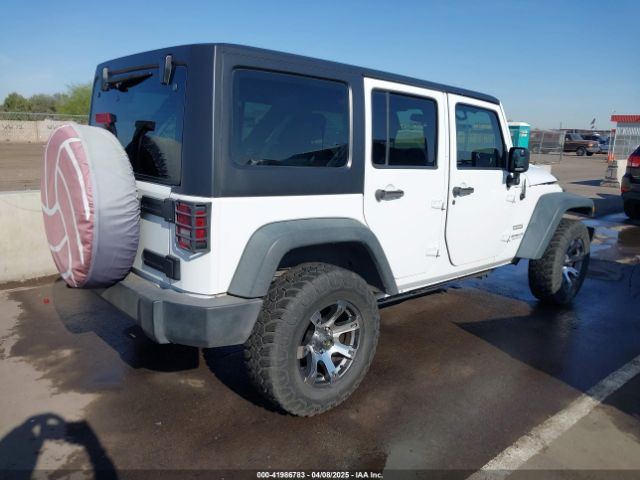 1C4BJWDG3EL247535 Jeep Wrangler Unlimited Sport