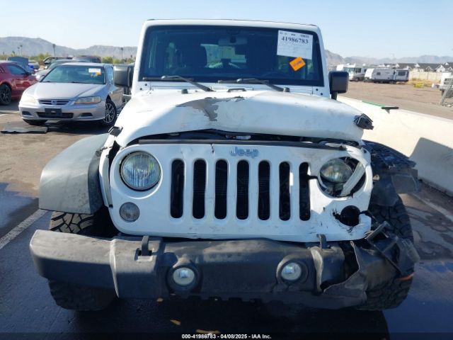 1C4BJWDG3EL247535 Jeep Wrangler Unlimited Sport