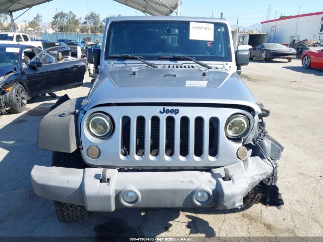 1C4BJWDG5GL309813 Jeep Wrangler Unlimited Sport