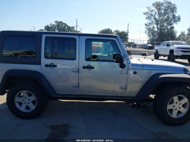 1C4BJWDG5GL309813 Jeep Wrangler Unlimited Sport