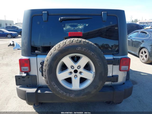 1C4BJWDG5GL309813 Jeep Wrangler Unlimited Sport
