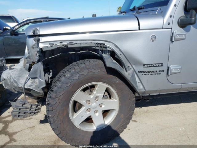 1C4BJWDG5GL309813 Jeep Wrangler Unlimited Sport