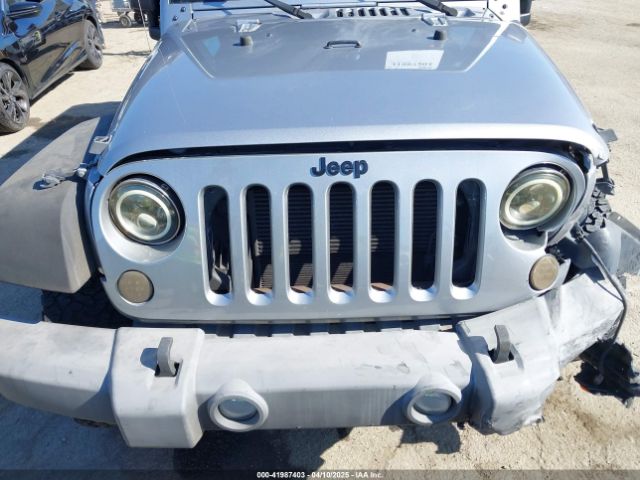1C4BJWDG5GL309813 Jeep Wrangler Unlimited Sport