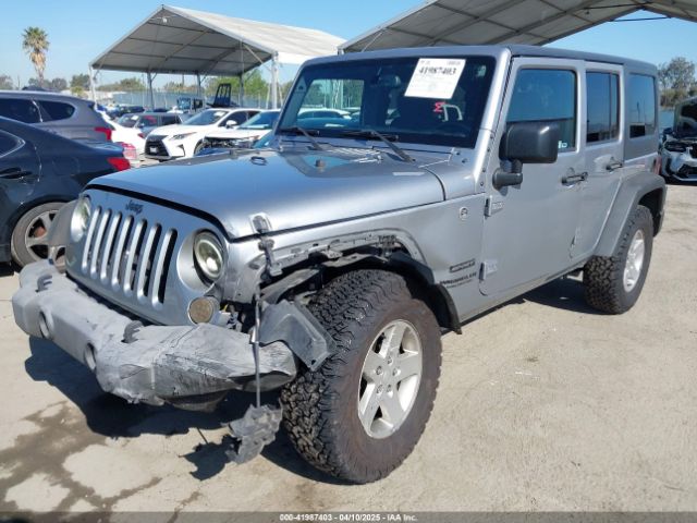 1C4BJWDG5GL309813 Jeep Wrangler Unlimited Sport