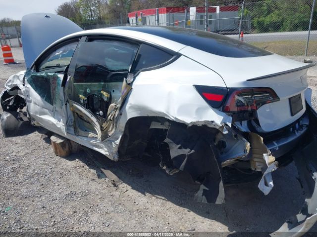 2021 TESLA MODEL 3 5YJ3E1ECXMF083757 Photo 2