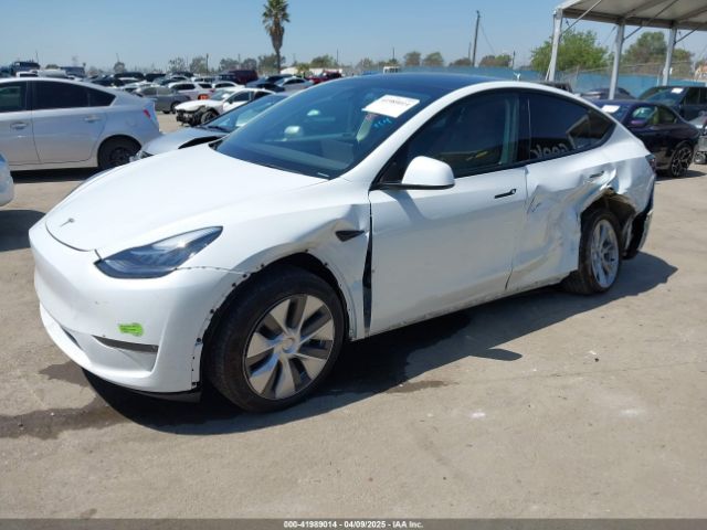 2023 TESLA MODEL Y 7SAYGDEE5PA104635 Photo 1