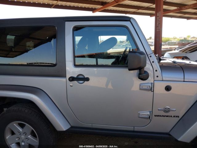 1C4AJWAG9EL194985 Jeep Wrangler Freedom Edition