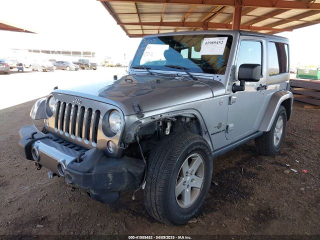 1C4AJWAG9EL194985 Jeep Wrangler Freedom Edition