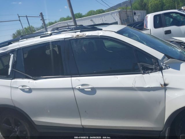 5FNYF8H09KB015198 Honda Passport Elite