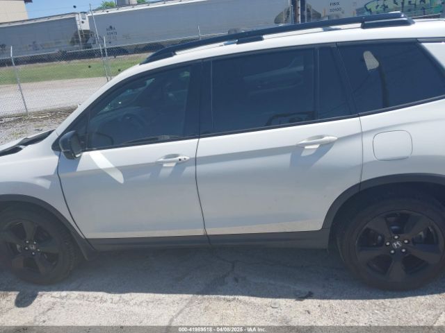 5FNYF8H09KB015198 Honda Passport Elite