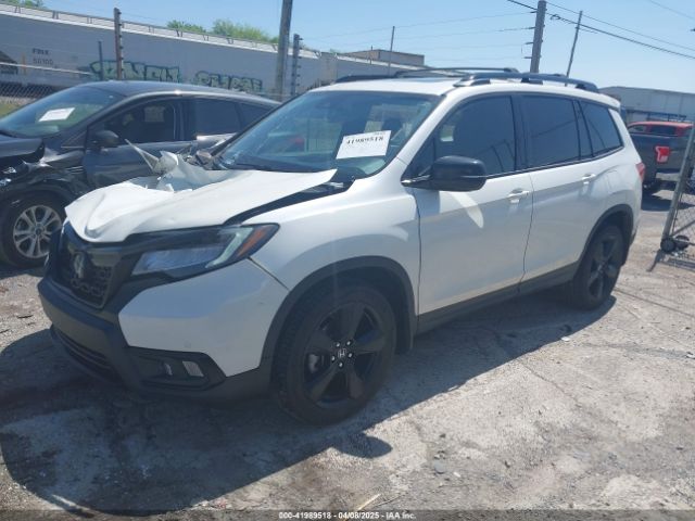 5FNYF8H09KB015198 Honda Passport Elite
