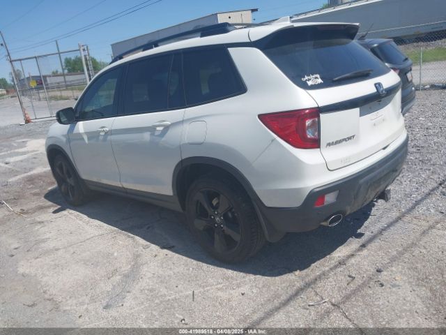 5FNYF8H09KB015198 Honda Passport Elite