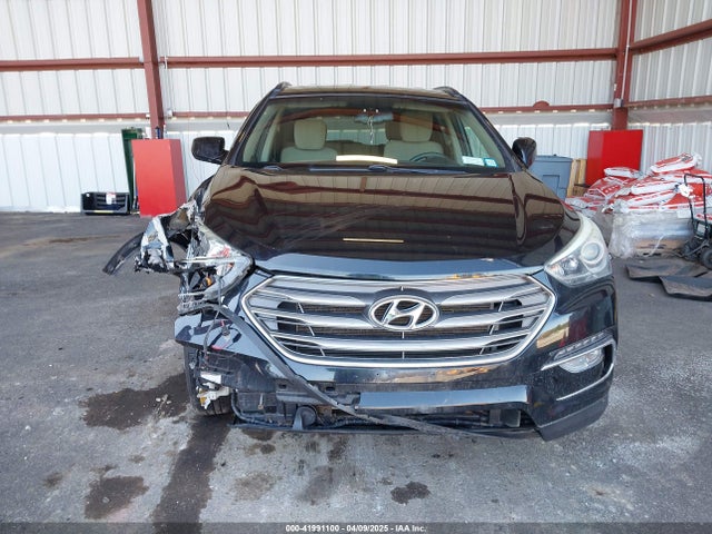 5NMZUDLB4HH031957 Hyundai Santa Fe Sport 2.4l