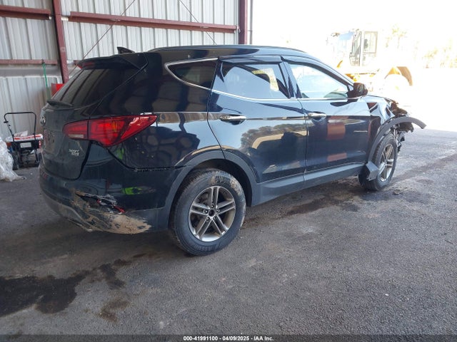 5NMZUDLB4HH031957 Hyundai Santa Fe Sport 2.4l