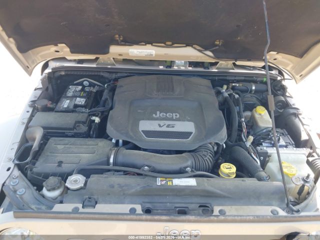 1C4BJWEG5GL310300 Jeep Wrangler Unlimited Sahara