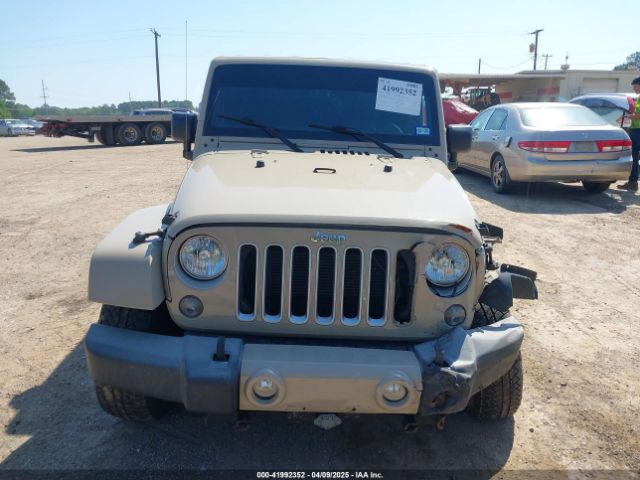 1C4BJWEG5GL310300 Jeep Wrangler Unlimited Sahara