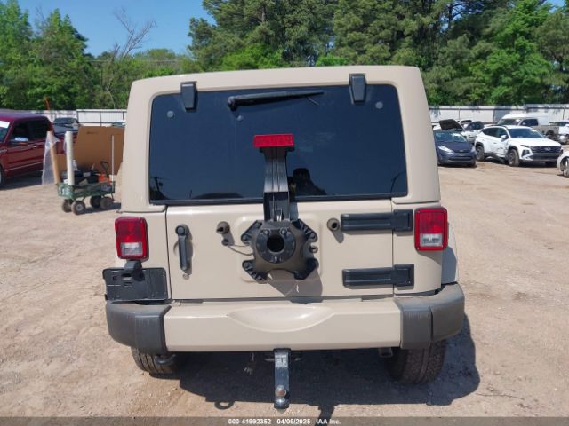 1C4BJWEG5GL310300 Jeep Wrangler Unlimited Sahara