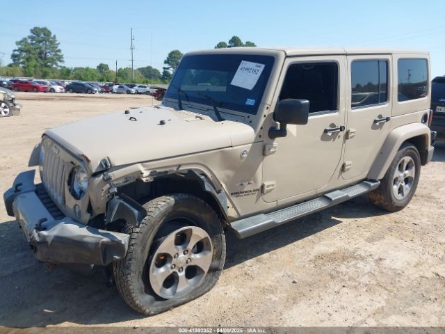 1C4BJWEG5GL310300 Jeep Wrangler Unlimited Sahara