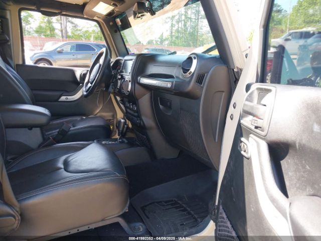 1C4BJWEG5GL310300 Jeep Wrangler Unlimited Sahara