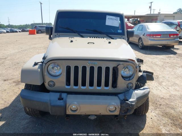 1C4BJWEG5GL310300 Jeep Wrangler Unlimited Sahara