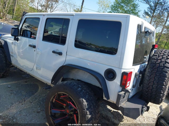 1C4HJWEG8EL320679 Jeep Wrangler Unlimited Sahara