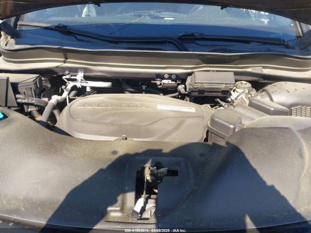 5FNYF8H04KB004657 Honda Passport Elite