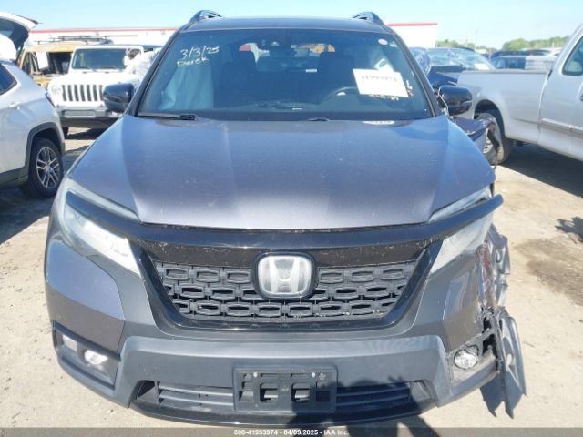 5FNYF8H04KB004657 Honda Passport Elite