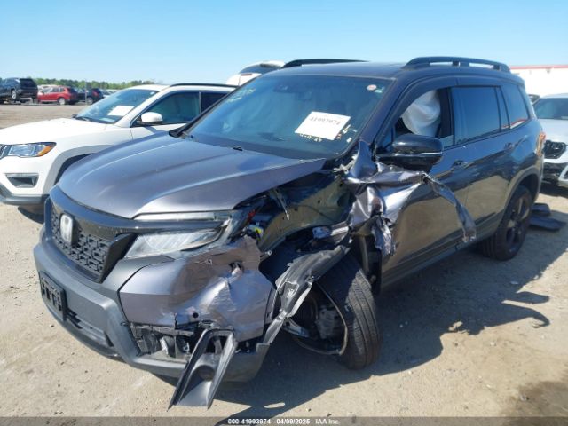 5FNYF8H04KB004657 Honda Passport Elite