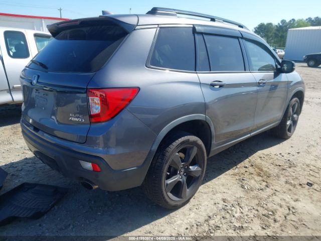 5FNYF8H04KB004657 Honda Passport Elite