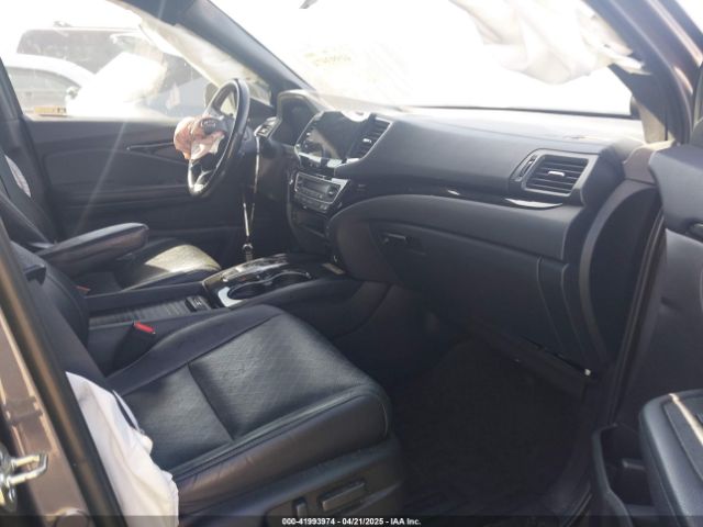 5FNYF8H04KB004657 Honda Passport Elite