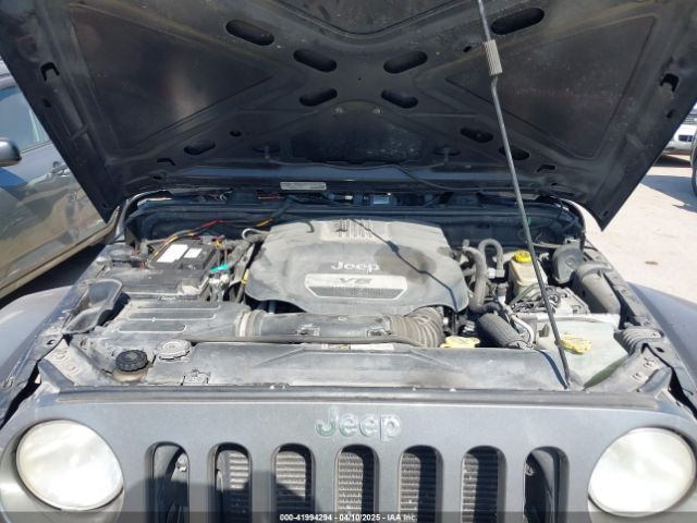 1C4HJWDG7EL235219 Jeep Wrangler Unlimited Freedom Edition