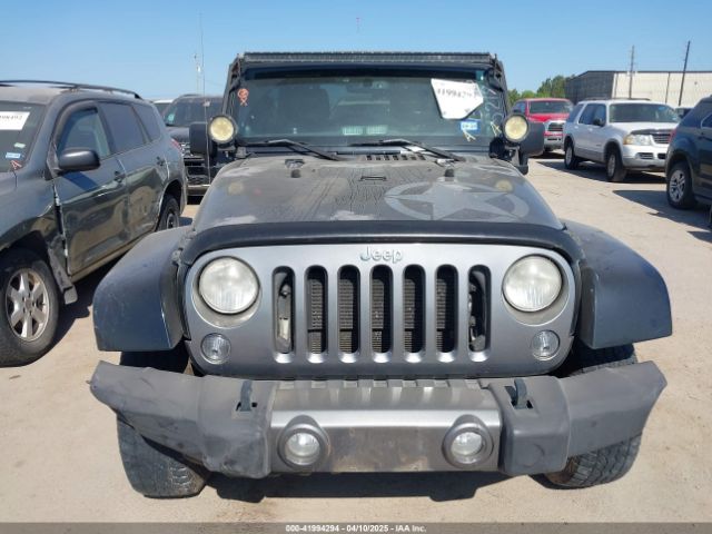 1C4HJWDG7EL235219 Jeep Wrangler Unlimited Freedom Edition