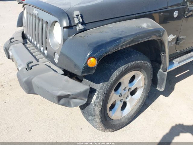 1C4HJWDG7EL235219 Jeep Wrangler Unlimited Freedom Edition
