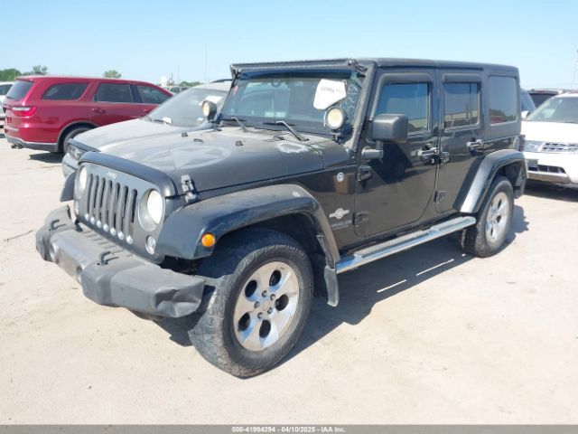 1C4HJWDG7EL235219 Jeep Wrangler Unlimited Freedom Edition