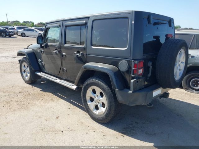 1C4HJWDG7EL235219 Jeep Wrangler Unlimited Freedom Edition