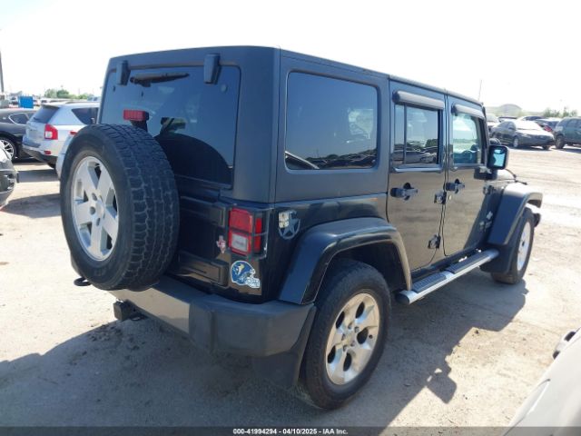 1C4HJWDG7EL235219 Jeep Wrangler Unlimited Freedom Edition