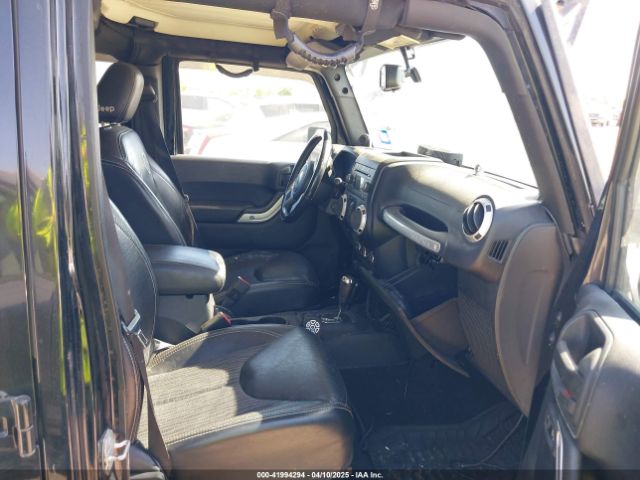 1C4HJWDG7EL235219 Jeep Wrangler Unlimited Freedom Edition