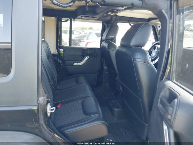 1C4HJWDG7EL235219 Jeep Wrangler Unlimited Freedom Edition