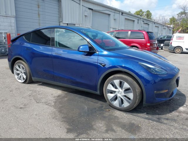 2023 TESLA MODEL Y 7SAYGAEE0PF892595 Photo 0
